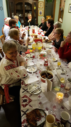 Photo: Dancers sitting at the dinner table